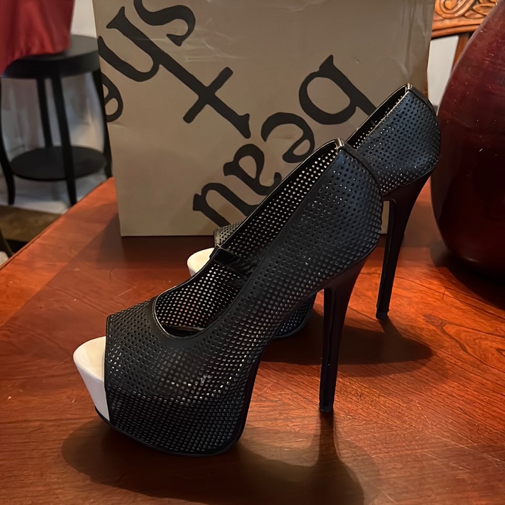 Black and white platform heels